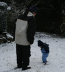 Thumbnail of Stamping in the snow with Daddy.jpg